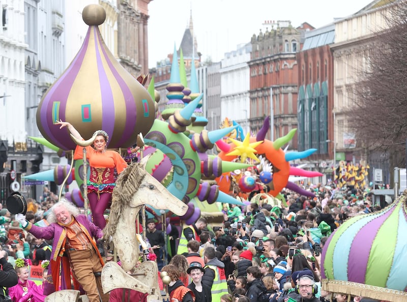 Performers entertain the crowd as  Thousands line the streets for the St Patrick’s day Parade in Belfast on Sunday.
PICTURE COLM LENAGHAN