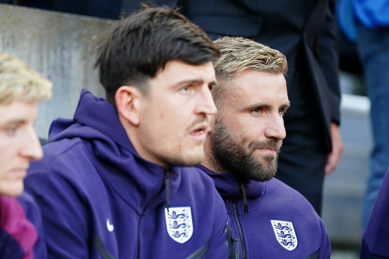 Luke Shaw, right, has been on the sidelines
