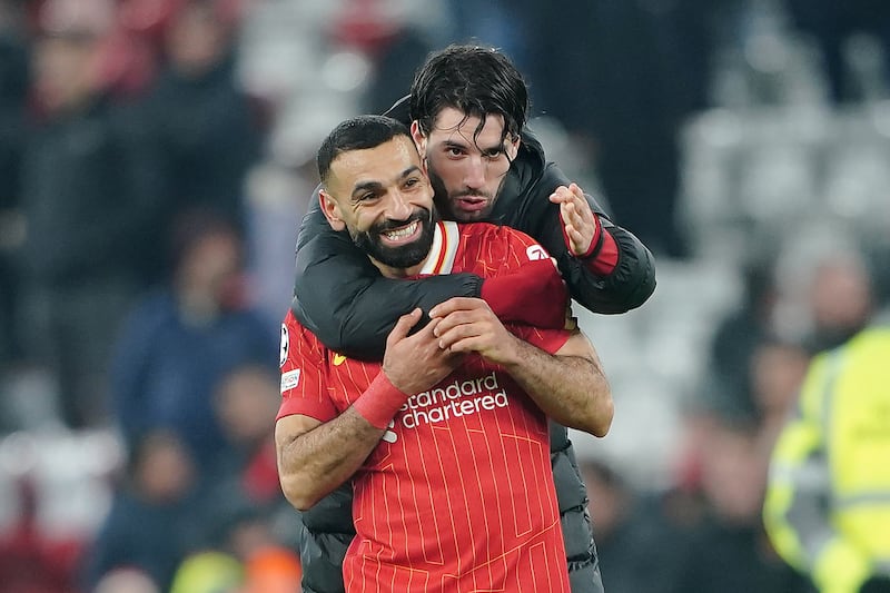 Mohamed Salah is congratulated by team-mate Dominik Szoboszlai after the final whistle