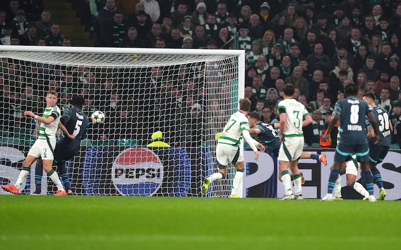 Christoph Baumgartner, centre right, dives to head RB Leipzig in front