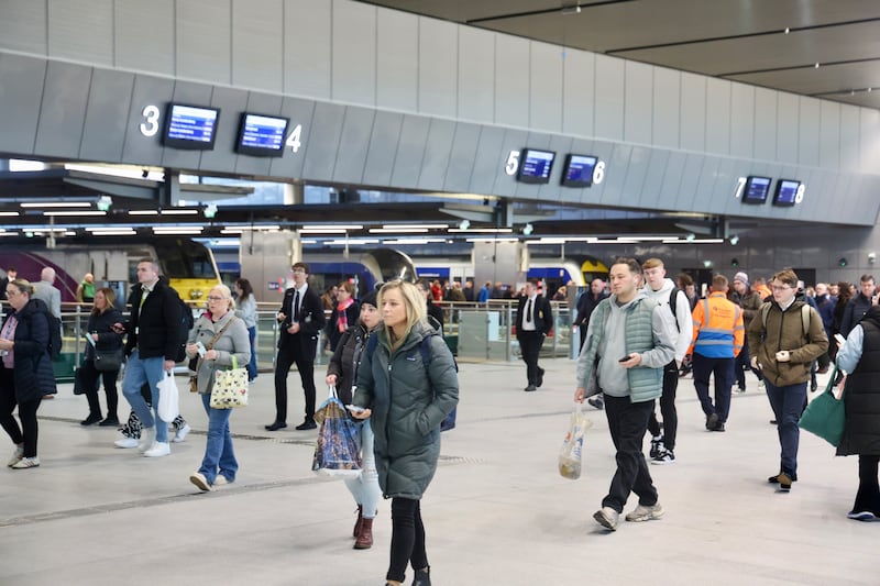 Train passengers arrive and depart from Grand Central Station in Belfast. PICTURE: MAL MCCANN