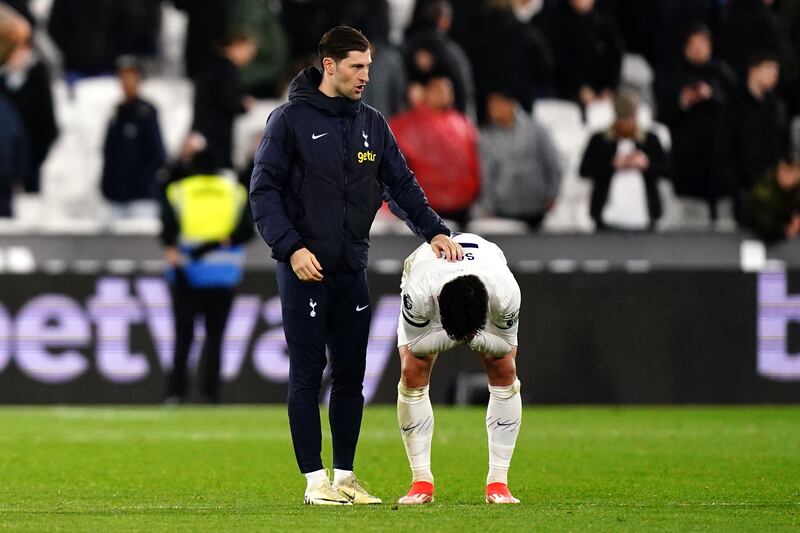 Son Heung-min, right, shows his frustration at full-time