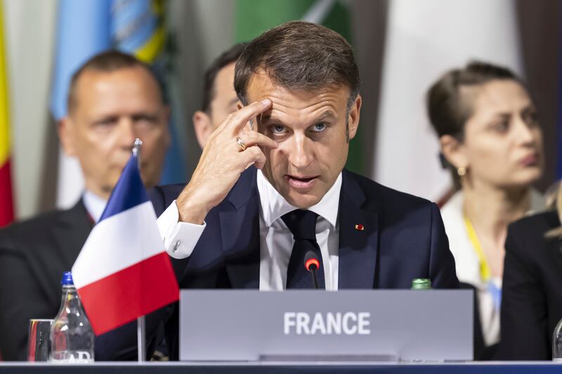 President Emmanuel Macron of France speaks during the opening plenary session, during the Summit on peace in Ukraine, in Obburgen, Switzerland (Urs Flueeler/AP)