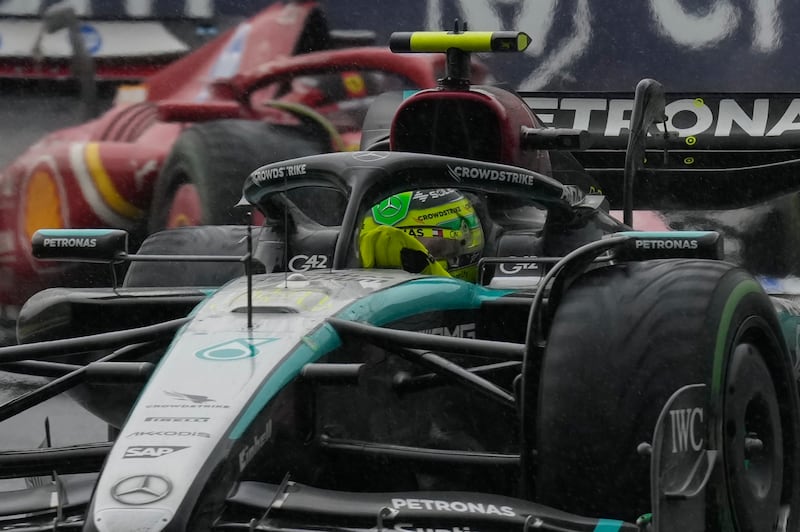 Lewis Hamilton competes in the Brazilian Grand Prix in Sao Paulo (Andre Penner/AP)