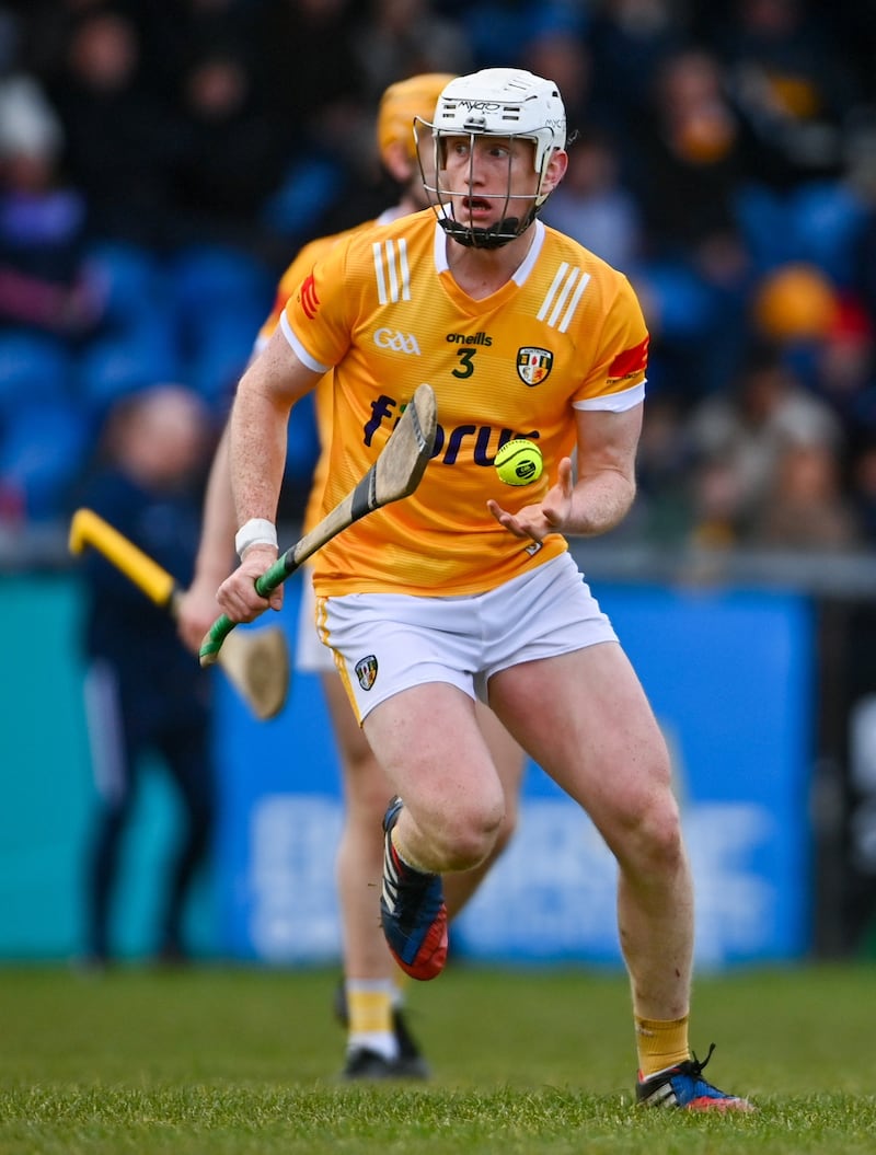 Rory McCloskey throwing the ball up for Antrim