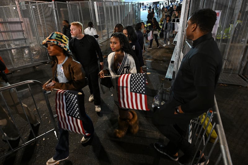 Attendees leave Democratic presidential nominee vice president Kamala Harris’s election night watch party in Washington DC (Terrance Williams/AP)