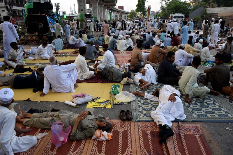 Hundreds of supporters of the key Islamist party began a sit-in protest in the garrison city of Rawalpindi late on Friday (AP)