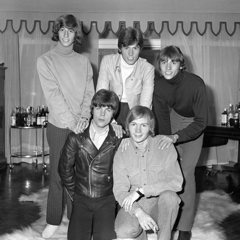 The Bee Gees: (back row, l-r) Robin Gibb, Barry Gibb, Maurice Gibb; (front row, l-r) Vince Melouney, Colin Petersen