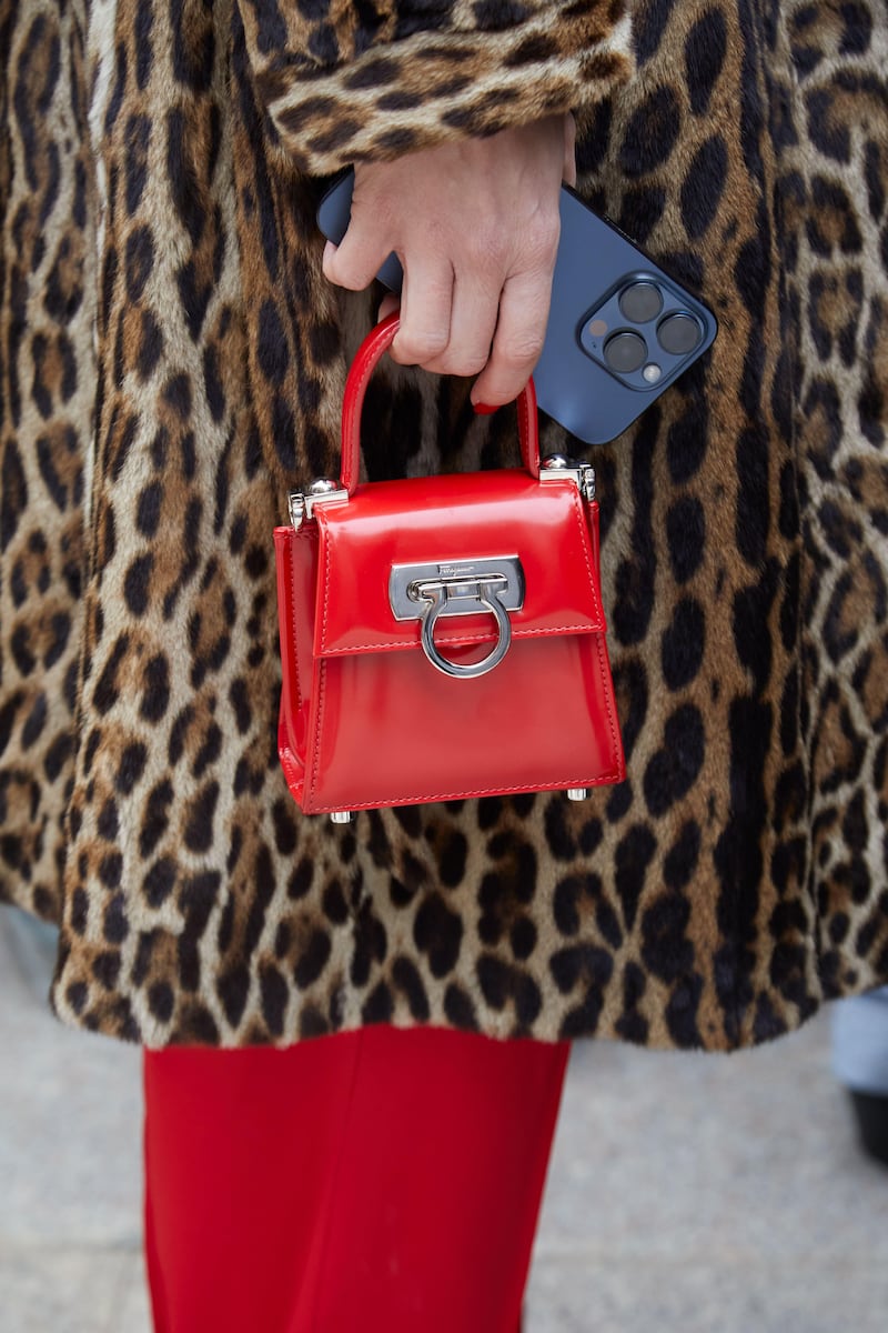 Pops of red and leopard have been trending all year and are predicted to continue into winter