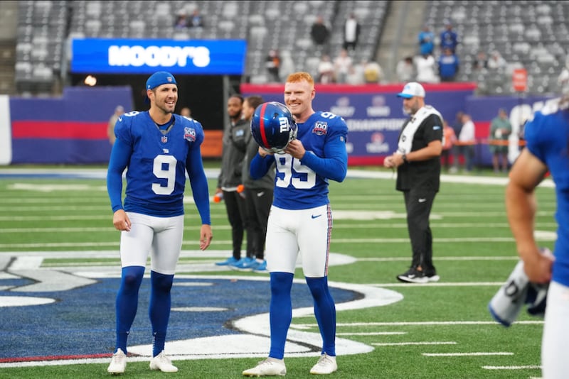 Jude McAtamney (99) warms up alongside Graham Gano ahead of their preseason game against the Detroit Lions at MetLife Stadium