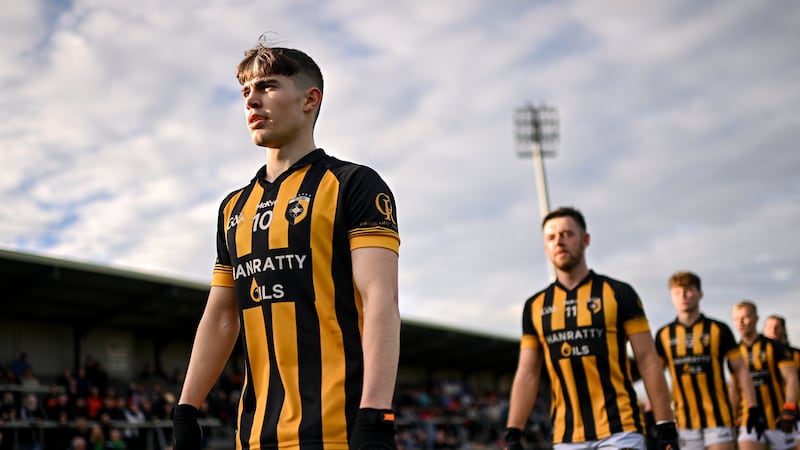 Caolan Finnegan walking behind the band ahead of the 2022 Armagh SFC final. His goal that day was typical of the way he plays. Photo by Ramsey Cardy/Sportsfile