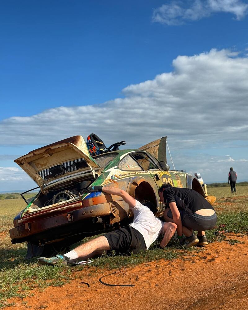 McErlean and Treacy performing road-side repairs.jpg