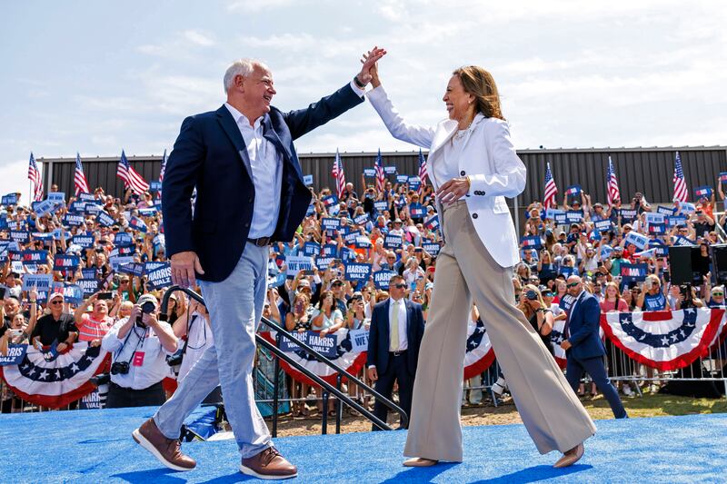 Kamala Harris and Tim Walz at a campaign rally in Wisconsin (Kerem Yucel/Minnesota Public Radio via AP)