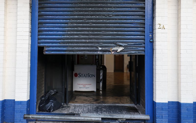 Damaged caused after A arson attack on a church in east Belfast which  is being treated as a racially motivated hate crime.
Two masked men used an angle-grinder type tool to cut a hole in the shutters of the church in Templemore Street shortly before 21:30 BST on Tuesday.
PICTURE COLM LENAGHAN