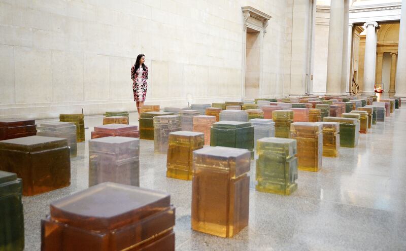 One Hundred Spaces, an installation of 100 jewel-like resin casts of the underside of chairs on display at Tate Britain ( John Stillwell/PA)