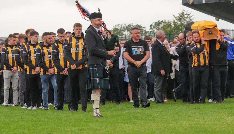 Family and Friends  carry the coffin of Crossmaglen Rangers player Caolan Finnegan during his funeral on Monday, Caolan received a lap of honour at Crossmaglen ground before the funeral at St Patrick’s Church.
PICTURE COLM LENAGHAN