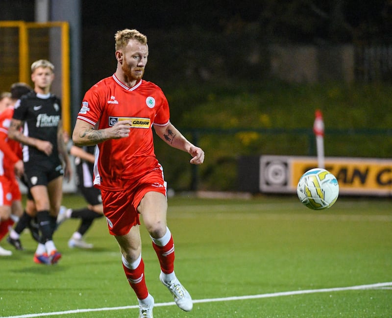 PACEMAKER PRESS BELFAST 22-10-24
Sports Direct Premiership
Match Day 6 (Game in hand)
Cliftonville v Larne
Michael Newberry of Cliftonville during this EveningÕs game at Solitude, Belfast.

Photo - Andrew McCarroll/ Pacemaker Press
Cliftonville defender Michael Newberry has died suddenly at the age of 27.
The English defender joined the club in the summer and made 24 appearances for the Reds.
Newberry, who started his career with hometown club Newcastle United, also had a spell in Iceland with Vikingur before he joined Linfield in 2021.
The former Northern Ireland Under-21 international spent three years with the Blues, winning two Irish Premiership titles.
Cliftonville's game against Dungannon Swifts and Linfield's match with Larne on Monday night have both been postponed.
In a statement posted on the club's website, Cliftonville said they were "devastated".