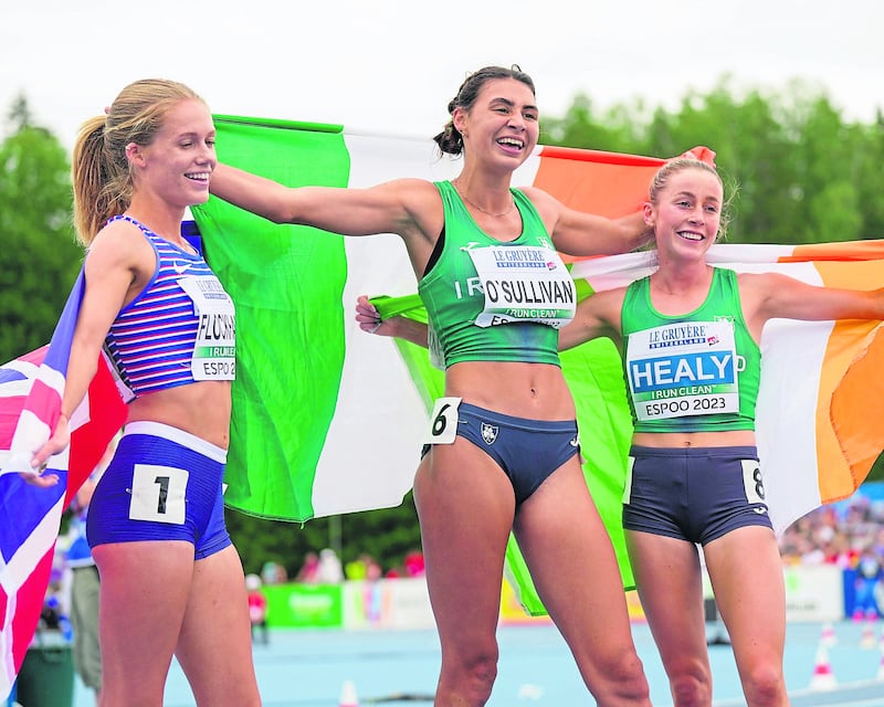 Sophie O'Sullivan celebrates her 1500m win with silver medallist Sarah Healy (right)