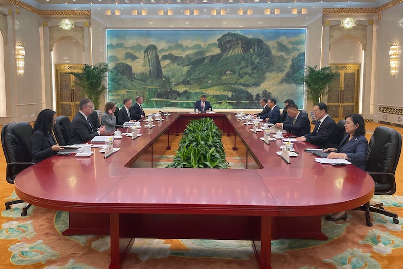 White House national security adviser Jake Sullivan, rear left, meets Chinese President Xi Jinping, centre, at the Great Hall of the People in Beijing (Trevor Hunnicutt/Pool Photo via AP)