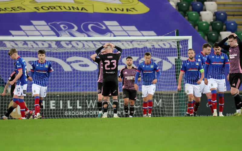 Glenavon's Keith Ward holds his head in frustration after his free kick goes just over the Linfield bar during Saturday's game at Windsor Park