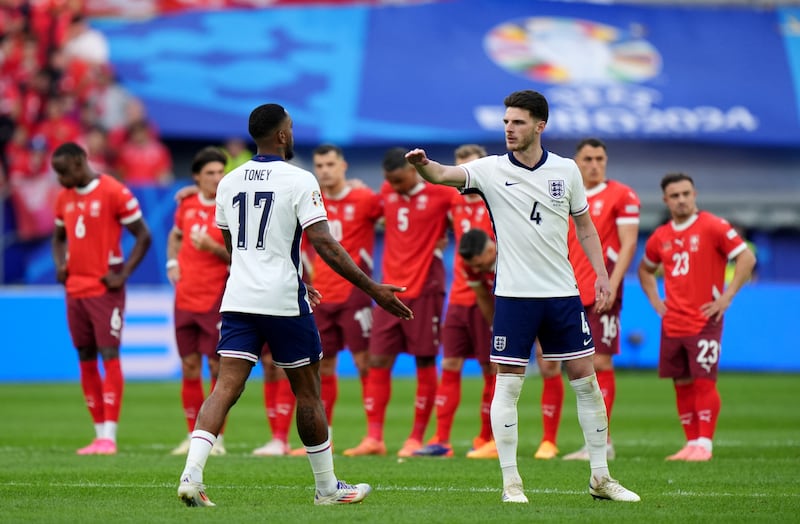 England’s Ivan Toney, left, is congratulated by Declan Rice after scoring his penalty against Switzerland