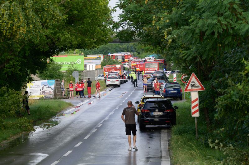 Emergency vehicles attended the scene of the collision (Henrich Misovic/TASR via AP)