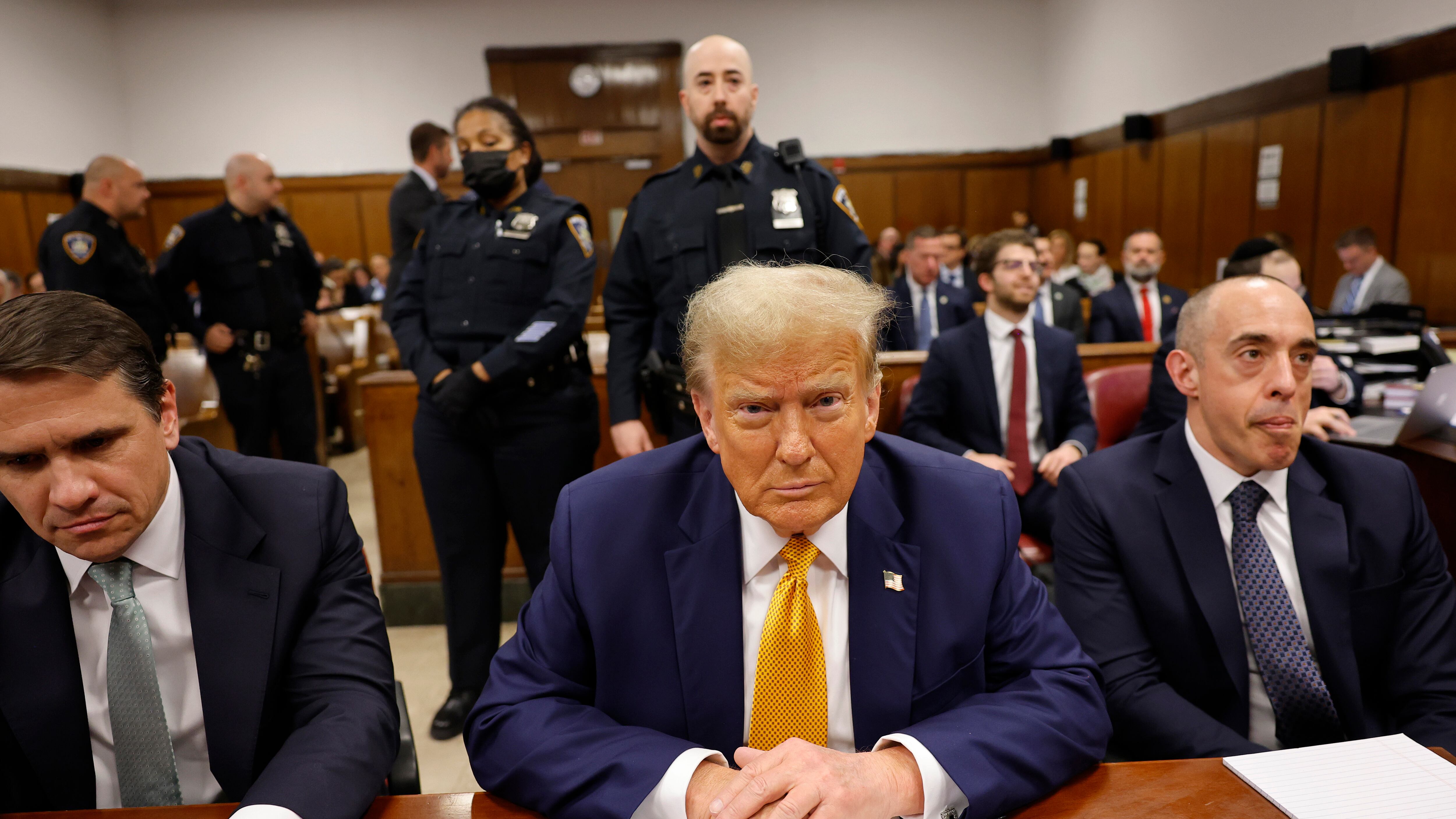 Former US president Donald Trump sits in the courtroom with lawyers Todd Blanche, left, and Emil Bove at Manhattan Criminal Court before his trial in New York (Michael M Santiago/Pool Photo via AP)