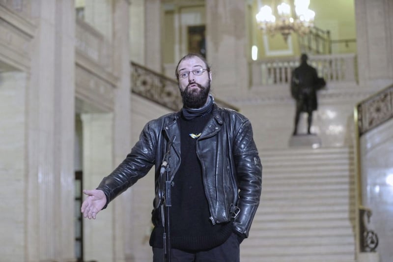 Abuse survivor Peter Murdock talks to the press at Stormont. Picture by Hugh Russell 