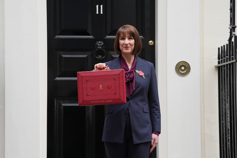 Chancellor of the Exchequer Rachel Reeves poses outside 11 Downing Street with her ministerial red box before delivering her Budget in the Houses of Parliament