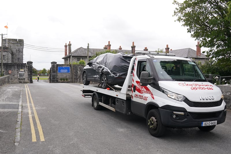 A car being removed from the scene