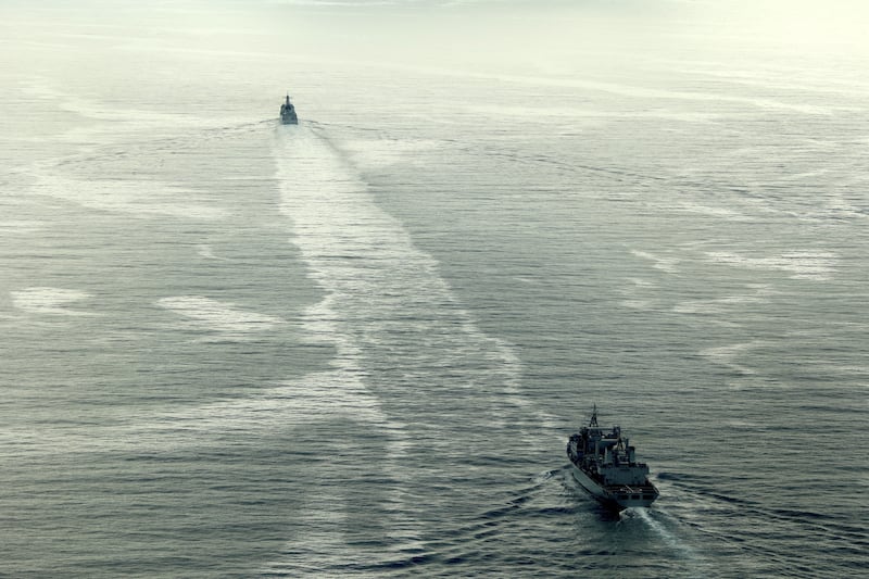 Chinese destroyer Jiaozuo (top) and support vessel Honghu travel through the English Channel