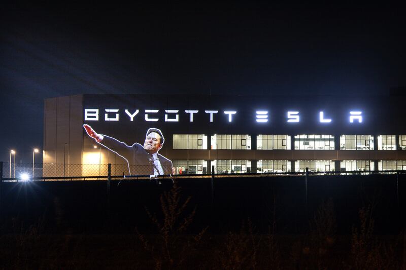 Led by Donkeys teamed up with German activist group Center for Political Beauty to project the image of Elon Musk on a Tesla Gigafactory in Berlin, Germany (Led By Donkeys)