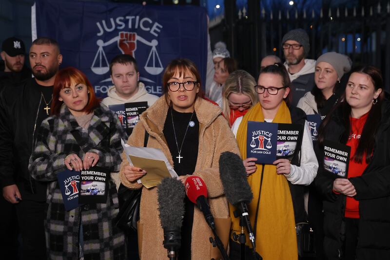 Toni Johnston (centre), daughter of Ian Ogle, speaking outside Laganside Courts, Belfast