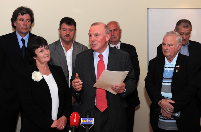 Dr John Kyle pictured in 2010 with members of the PUP executive