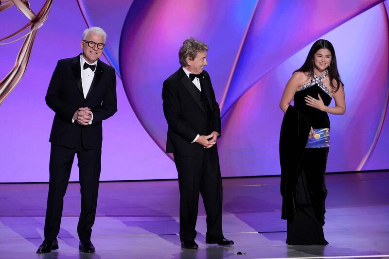 Steve Martin, from left, Martin Short, and Selena Gomez present the award for outstanding supporting actor in a comedy series during the 76th Primetime Emmy Awards (AP Photo/Chris Pizzello)