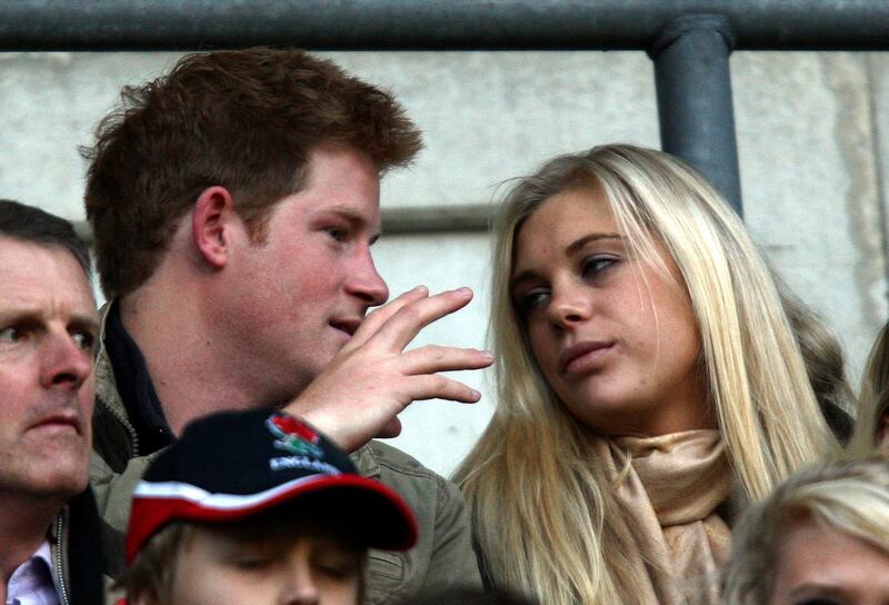 Harry and then-girlfriend Chelsy Davy together at the rugby in 2009