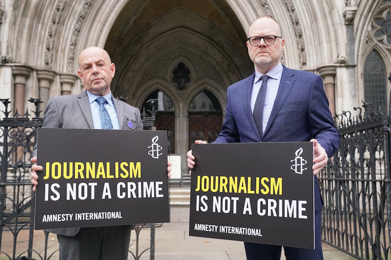 Journalists Barry McCaffrey (left) and Trevor Birney outside the Royal Courts of Justice in London