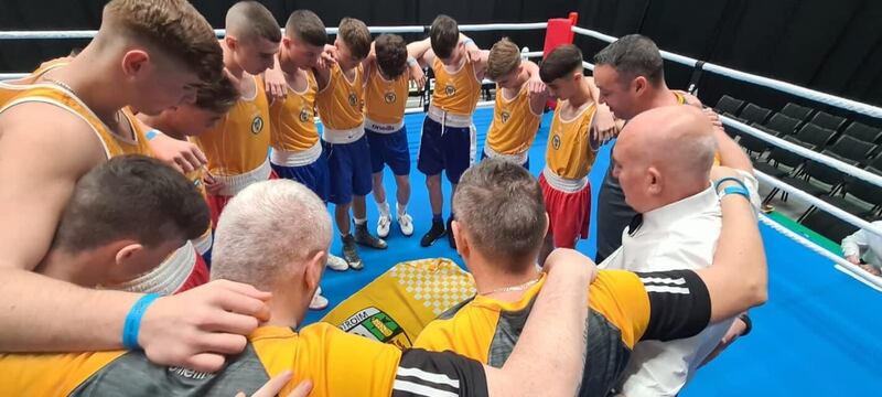 The County Antrim boxers, coaches and referee Joe Lowe bow their heads as a minute’s silence is observed at the HSK Box Cup in Denmark. Holy Trinity duo Johnny Doherty and Kyle Smith returned with gold after impressive performances in the ring, while Louis Rooney (Star), Karl Reilly (Immaculata) and Brandon McKelvie (Clonard) won their titles via walkover. Clonard’s Jamie Graham and Darragh Smyth, and Ormeau Road’s Anthony Taggart, claimed silver, while there was bronze for Casey Walsh (North Down) and Ciaran O’Neill (Scorpion). The coaching team was Liam Cunningham (Saints), Barry McMahon (Star) and Peter Graham (Clonard)