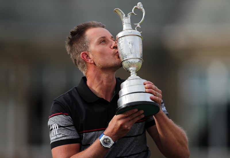 Henrik Stenson kisses the Claret Jug after winning the 2016 Open after a final-round duel with Phil Mickelson