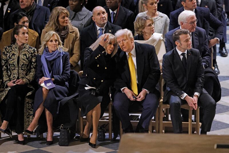 Dignitaries including Donald Trump gather to mark the reopening of the landmark cathedral (Ludovic Marin, Pool via AP)