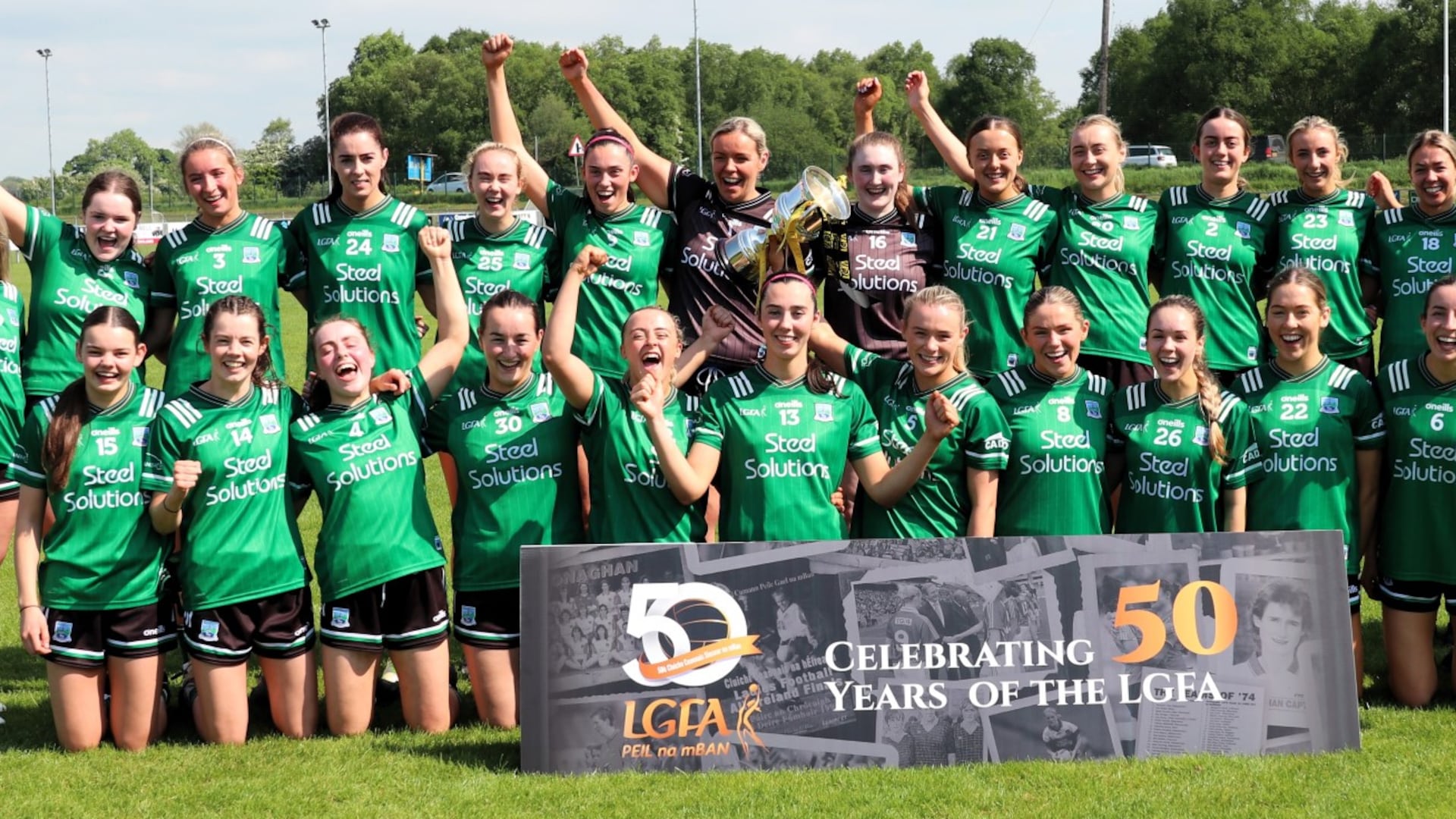 Fermanagh players celebrate Ulster Junior Championship victory.