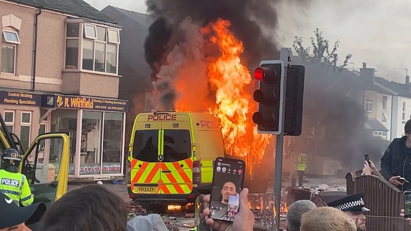 A police van was set alight as trouble flared during a protest in Southport, after the killing of three young girls