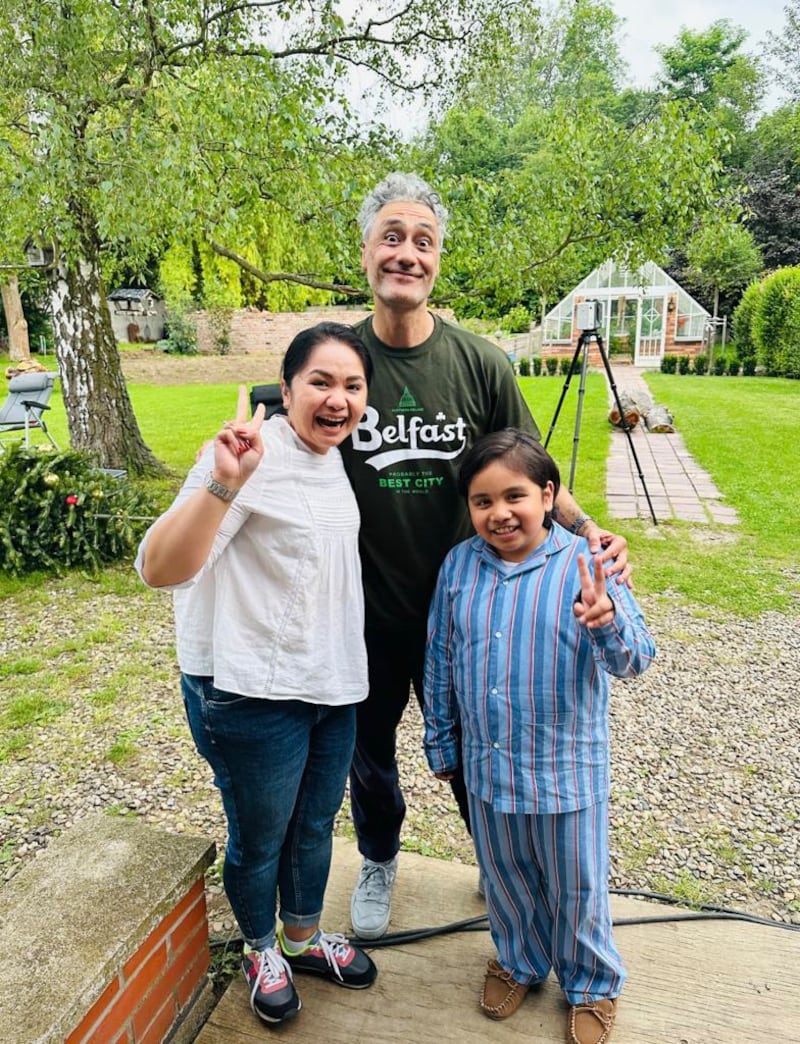 Portadown schoolboy Solomon with mum Maria and acclaimed film director Taika Waititi