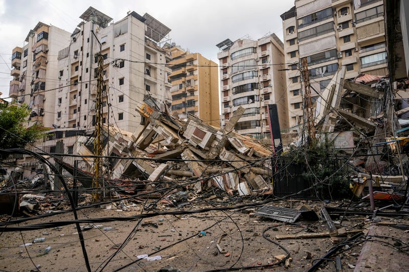 A damaged building at the site of an Israeli airstrike in a southern suburb of Beirut (Hassan Ammar/AP)