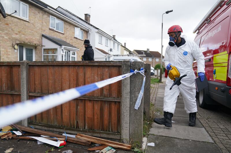 Forensic investigation officers at the scene