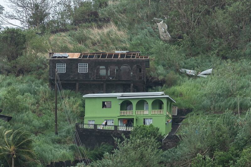 Houses damaged by Hurricane Beryl in Kingstown, St Vincent and the Grenadines (Lucanus Ollivierre/AP)