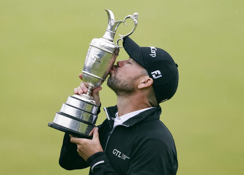 Brian Harman kisses the Claret Jug after winning The Open at Royal Liverpool
