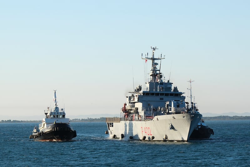 The Italian navy ship Libra arrives at the port of Shengjin (Vlasov Sulaj/AP)