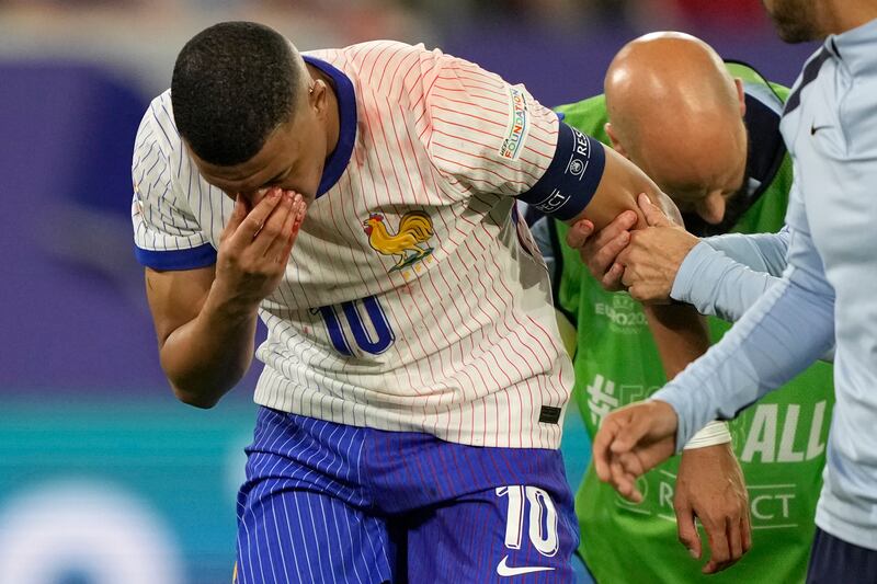 Mbappe was forced off late on with an injury to his nose (Martin Meissner/AP)