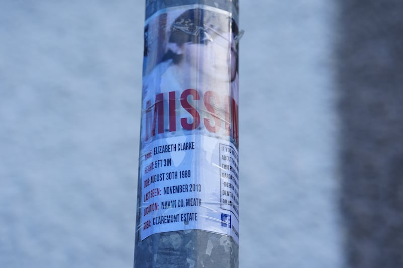 An appeal leaflet attached to a pole near the house which is being searched by Garda in Navan as the investigation into the disappearance of Elizabeth Clarke continues